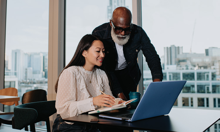 Two people in office