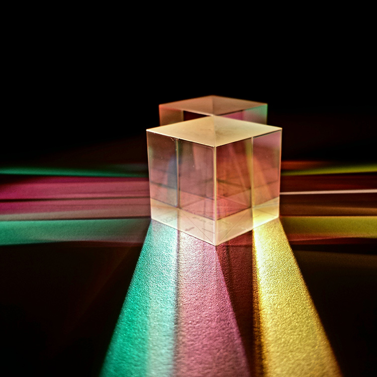 This image shows a number of optical phenomena, starting with a green laser (532-nm Nd:YAG) guided by a multimode silica optical fiber to a vial containing an organic dye